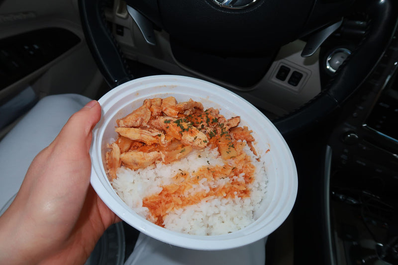 Meal in hand in the car